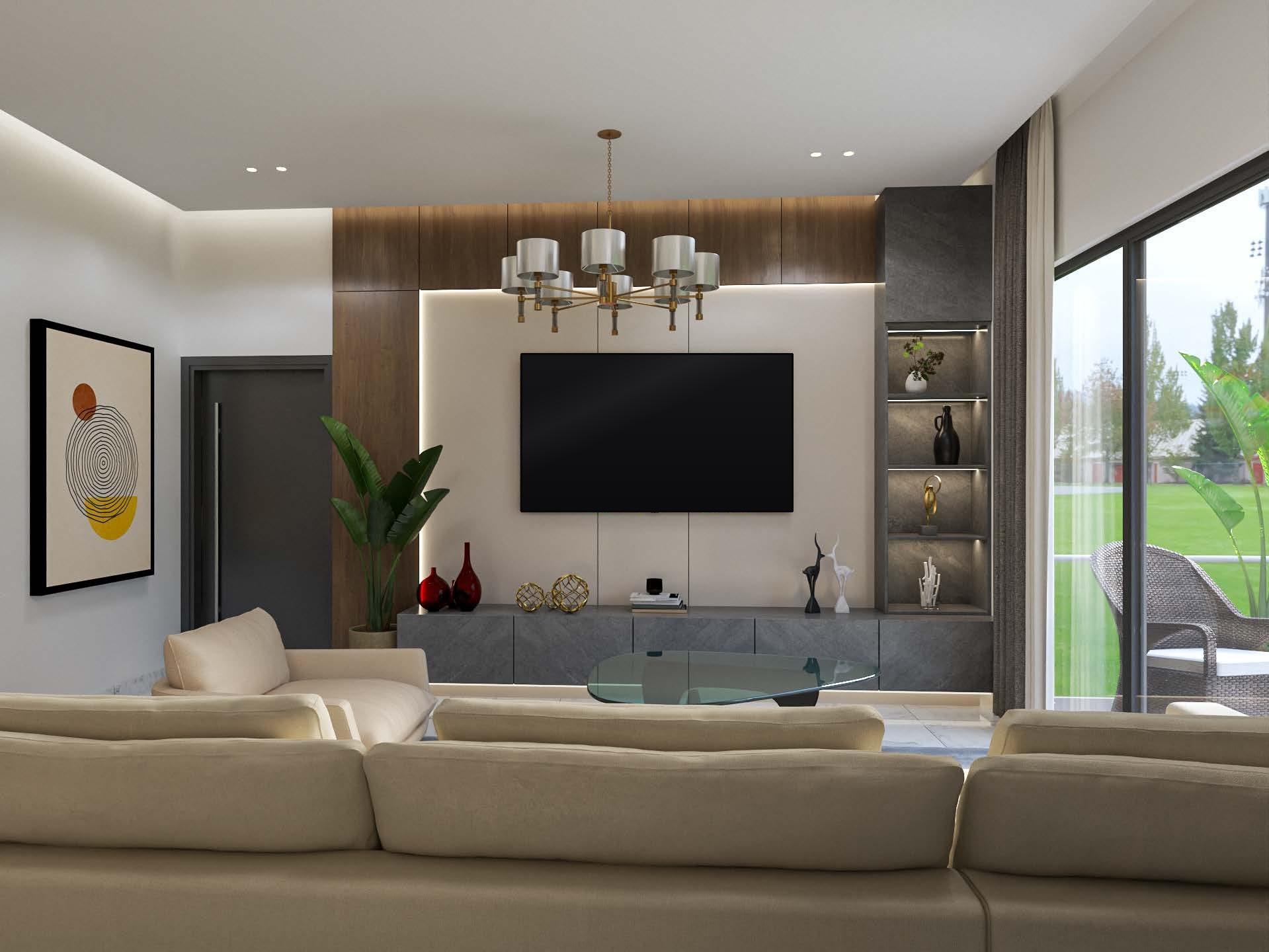 Living room seen from the sofa: walnut panelling, a brass chandelier and lit display shelves